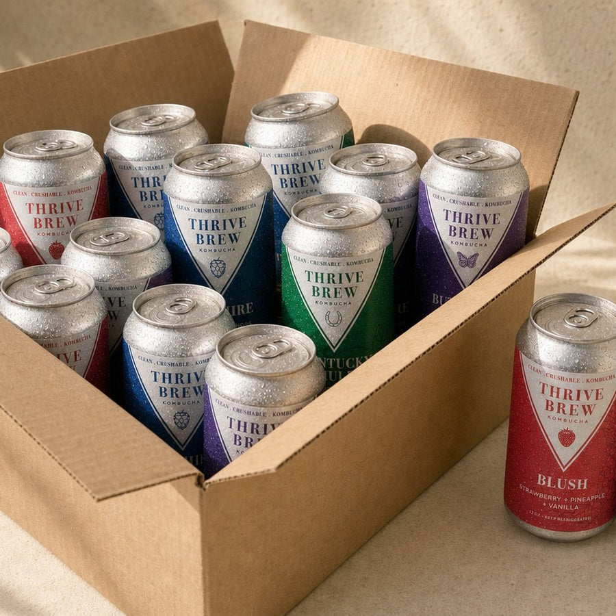 Customize Kombucha Subscription: open box of 24 mixed Thrive Brew cans